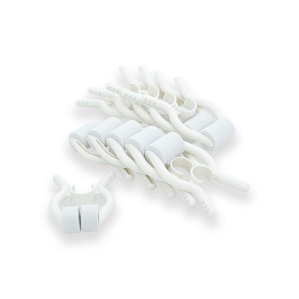 A bundle of white disposable noseclips.