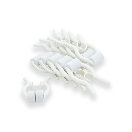 A bundle of white disposable noseclips.